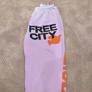 I’m selling these purple and orange free city sweatpants!!